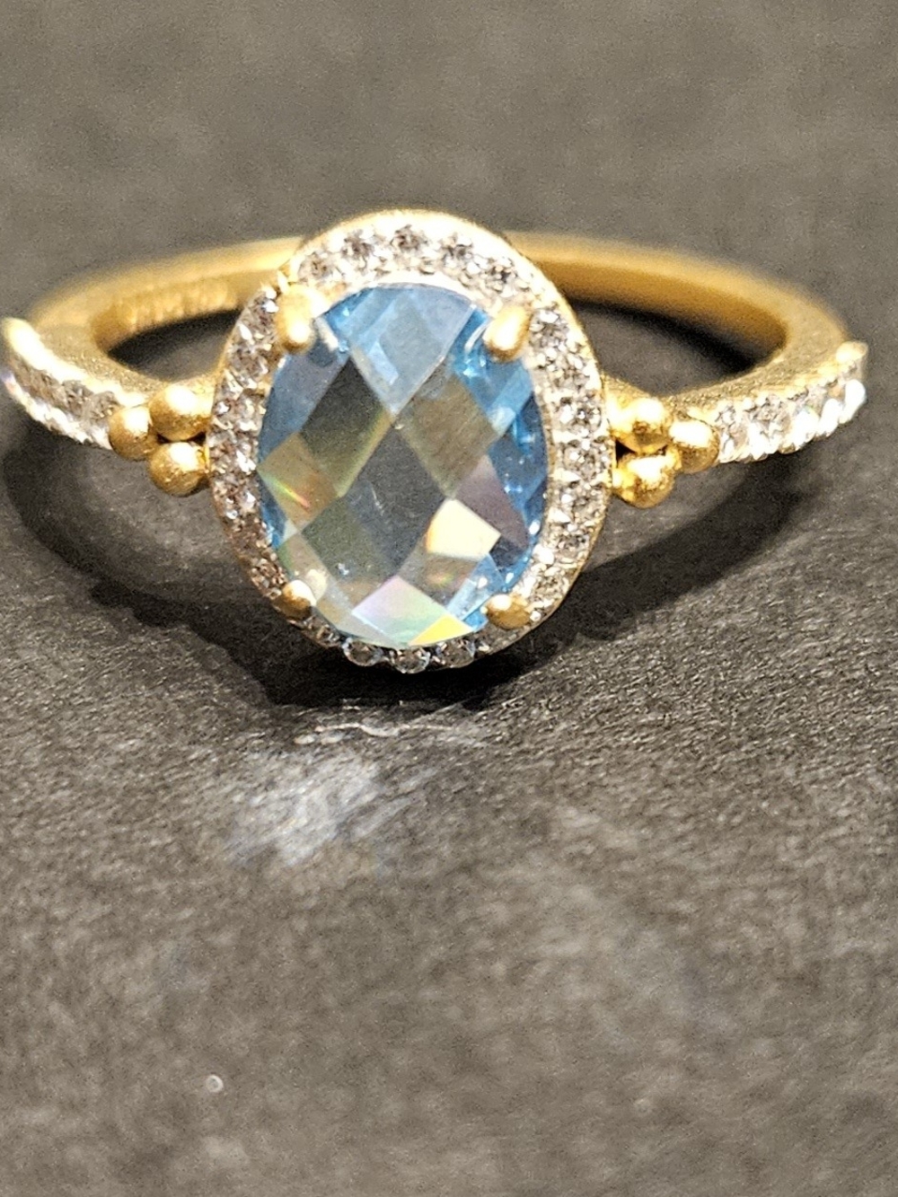925 Sterlung In Gold Plaited with Blue Oval Gemstone and Pavé Accents